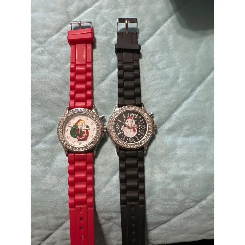 BT  Christmas Musical watches‎ . Both need batteries. Santa and Snowman